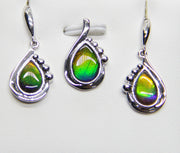 Ammolite Earrings And Pendant Set. Color changing from purple, to blue, green, yellow to gold. 